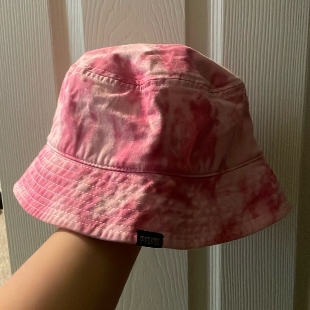PINK bucket hat. The color is baby pink and a hot ish pink.